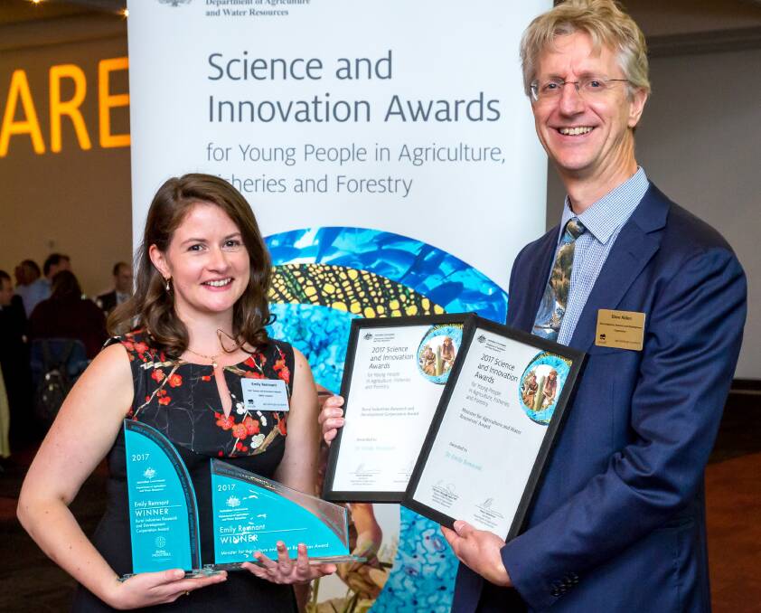 AWARD WINNER: Dr Emily Remnant, recipient of the 2017 Science and Innovation Award for Young People in Agriculture, Fisheries and Forestry, with Dr Dave Alden, former AgriFutures Australia general manager, research and innovation. 