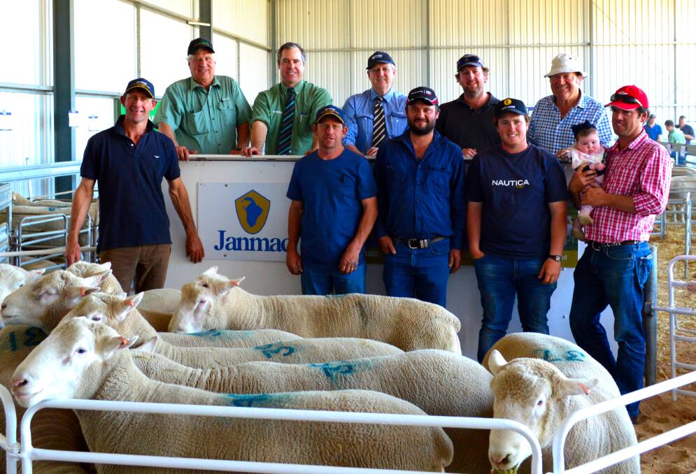 In the auctioneers box are Landmark's David Heinrich and Richard Miller, Rodwells Edenhope's David Hannel, and long-term clients, Paul Brook and Bill Rich. Joining them in the ring are Janmacs Grant and Bryce Hausler, Craig Rich, Jacob McGennisken (Rich Family Farms) and Stephen Rich holding daughter Eloise.