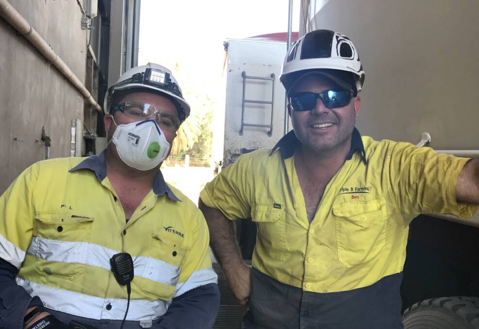 Viterra Port Pirie operator Paul Wright with grower Ben Bussenschutt, whose family delivered the first load of barley for the 2017-18 season on Tuesday.